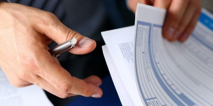 Person looking through documents